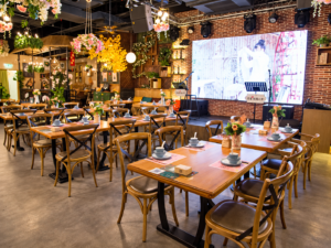 Music themed restaurant dining area with wooden tables and chairs